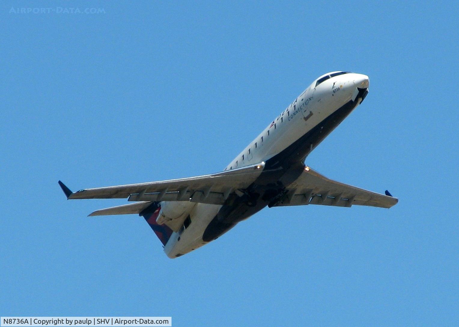 N8736A, 2003 Canadair CRJ-440 (CL-600-2B19) Regional Jet C/N 7736, Off of 14 at Shreveport Regional.