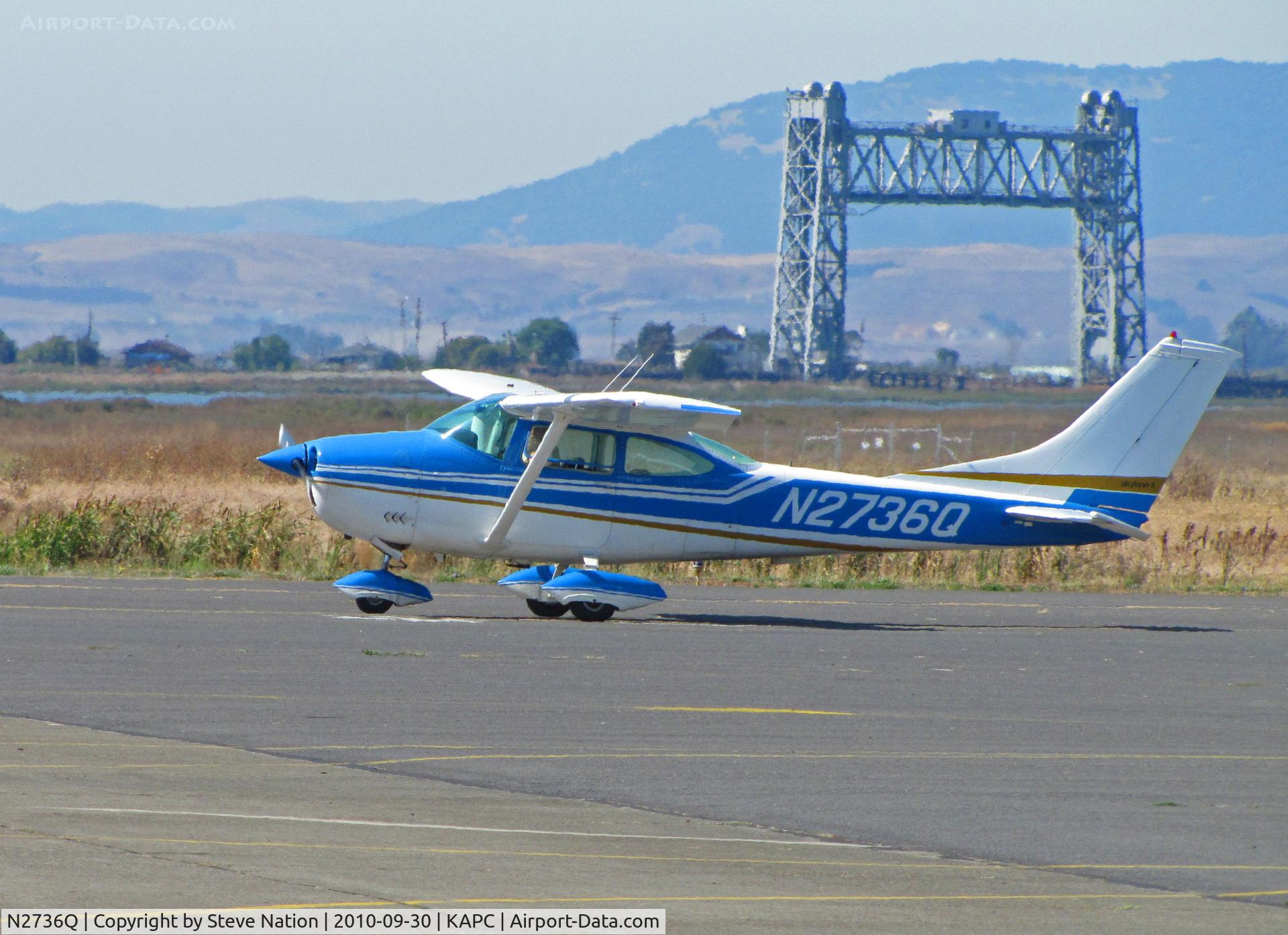 N2736Q, 1967 Cessna 182K Skylane C/N 18257936, Locally-based 1967 Cessna 182K taxiing for takeoff past Napa River RR bridge