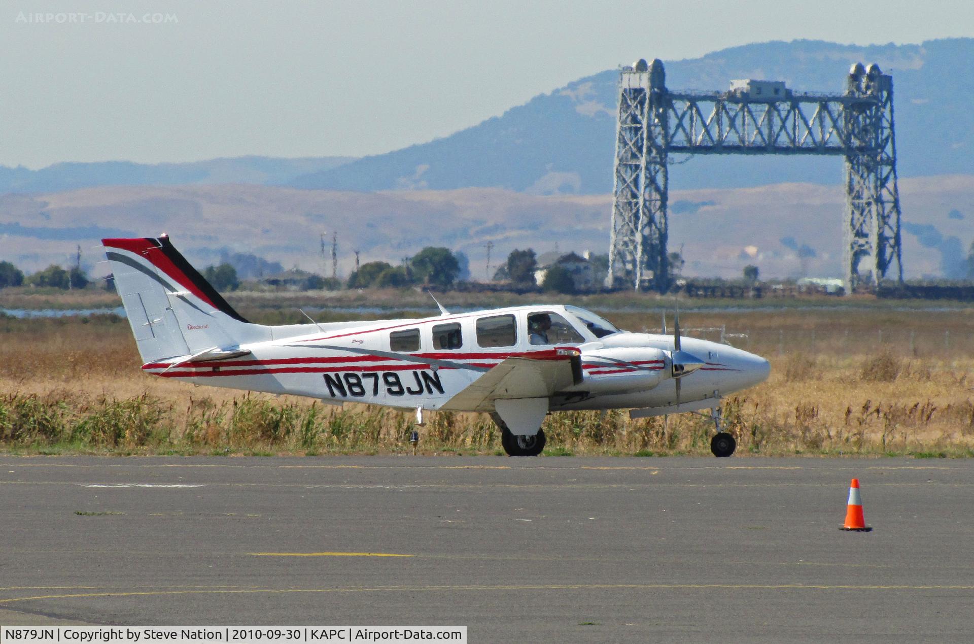 N879JN, Beech 58 Baron C/N TH-2066, Japan Air Lines Beech 58 returning from training flight -Napa River RR bridge