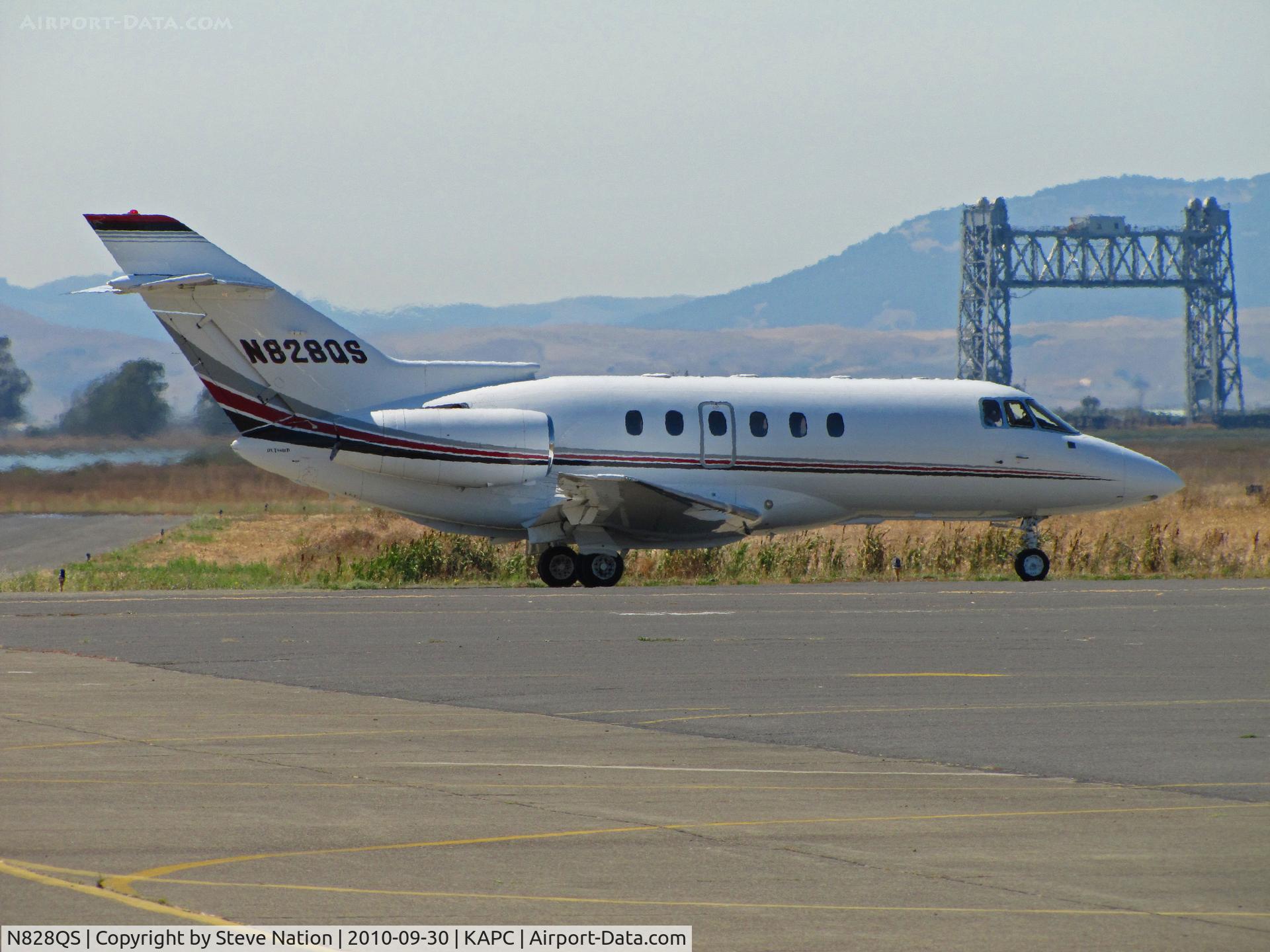 N828QS, 2001 Raytheon Hawker 800XP C/N 258528, Napa River RR bridge frames Netjets 2001 Hawker 800XP departing for KSUS (Spirit of St.Louis Airport, MO)