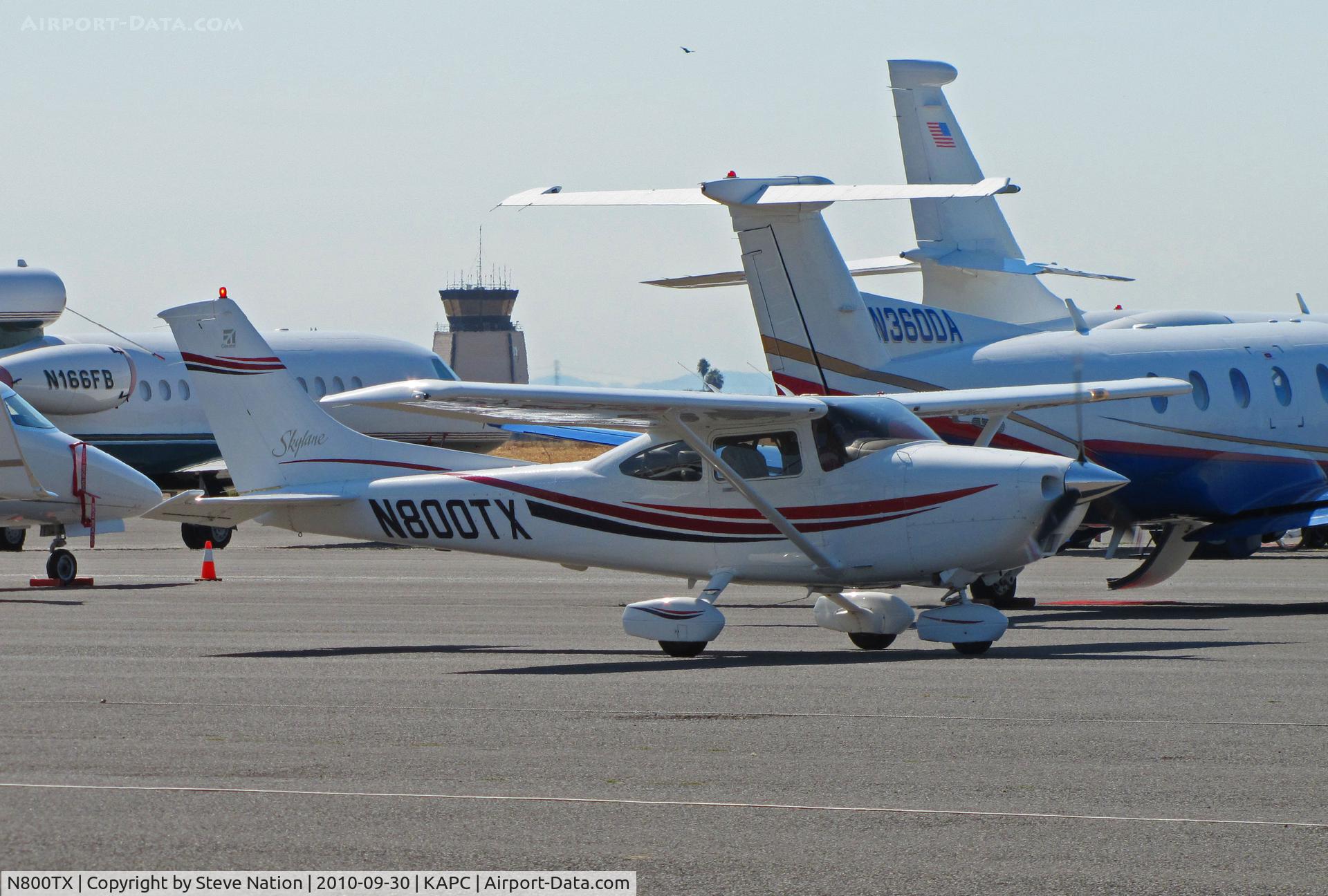 N800TX, 1999 Cessna 182S Skylane C/N 18280526, Southern California-based 1999 Cessna 182S taxiing across bizjet ramp for trip home to KCMA (Camarillo, CA)