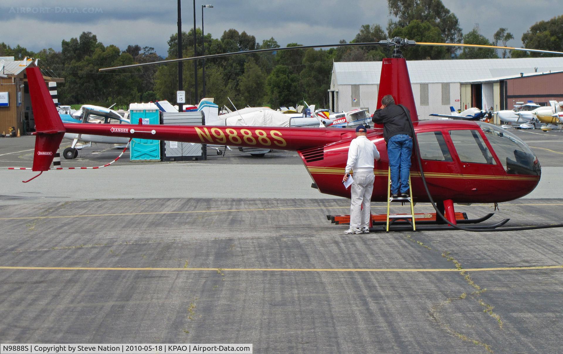 N9888S, 2007 Robinson R44 II C/N 11821, Sirrius Aviation 2007 Robbie R44 receiving TLC at Palo Alto, CA