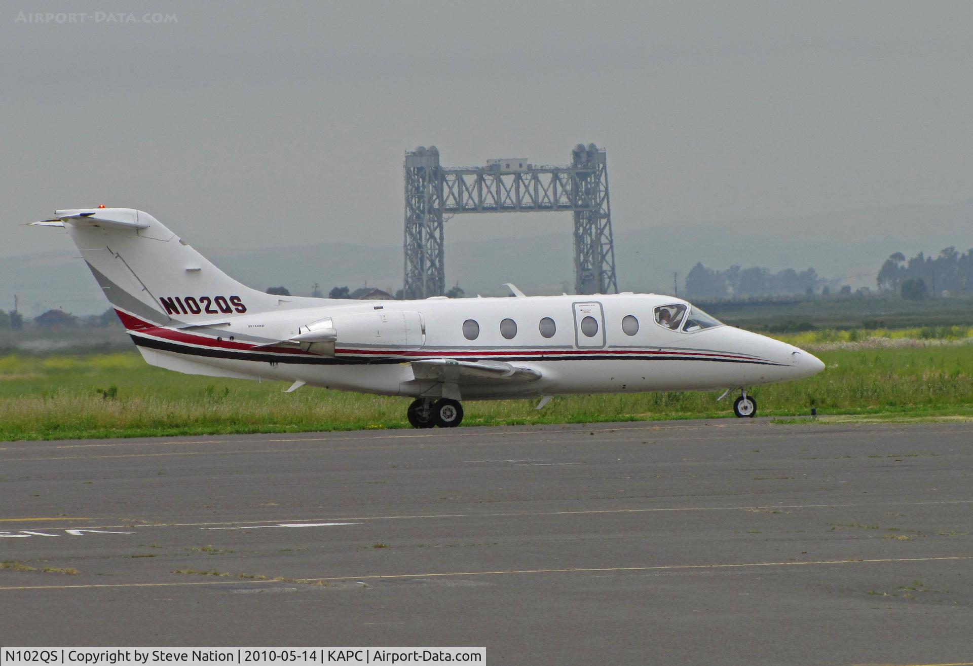 N102QS, Raytheon Beechjet 400A C/N RK-380, Framed by Napa River RR bridge this NetJets Raytheon 400 departing Napa, CA for KOXR (Oxnard, CA)