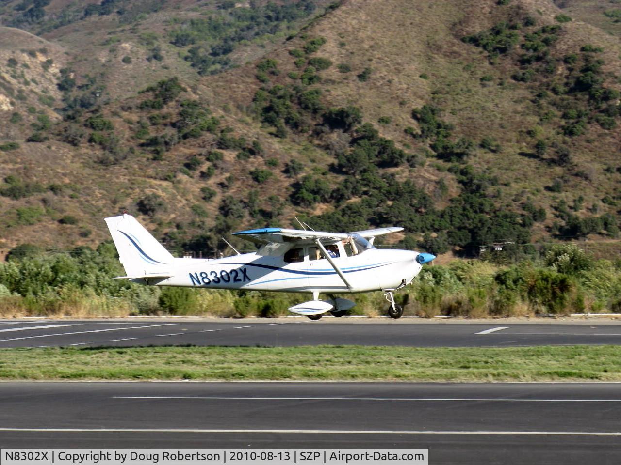 N8302X, 1961 Cessna 172C C/N 17248802, 1961 Cessna 172C, Continental O-300 145 Hp, landing Rwy 22L