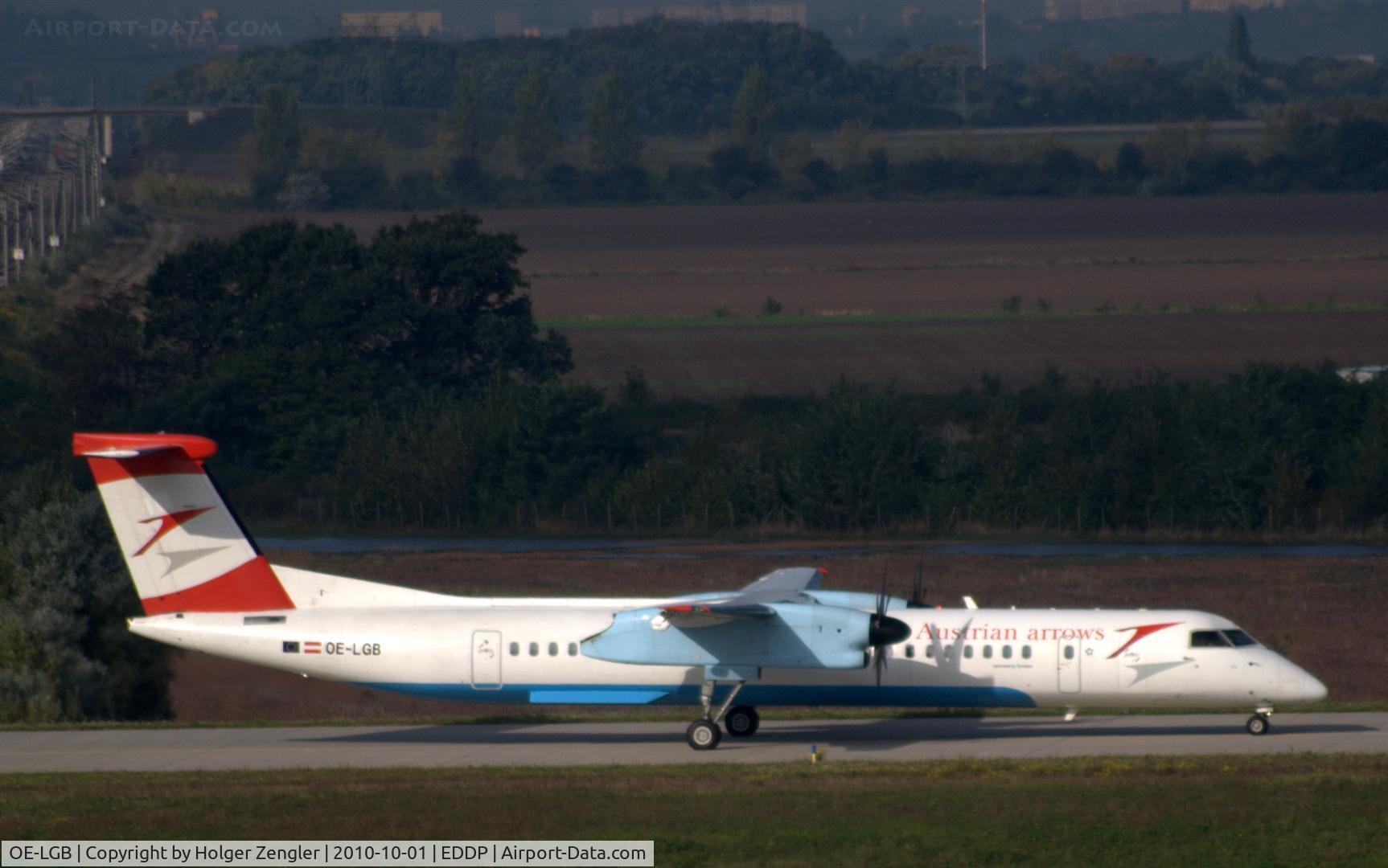 OE-LGB, 1999 De Havilland Canada DHC-8-402Q Dash 8 C/N 4015, Taxiing to rwy 08L for take off to Vienna