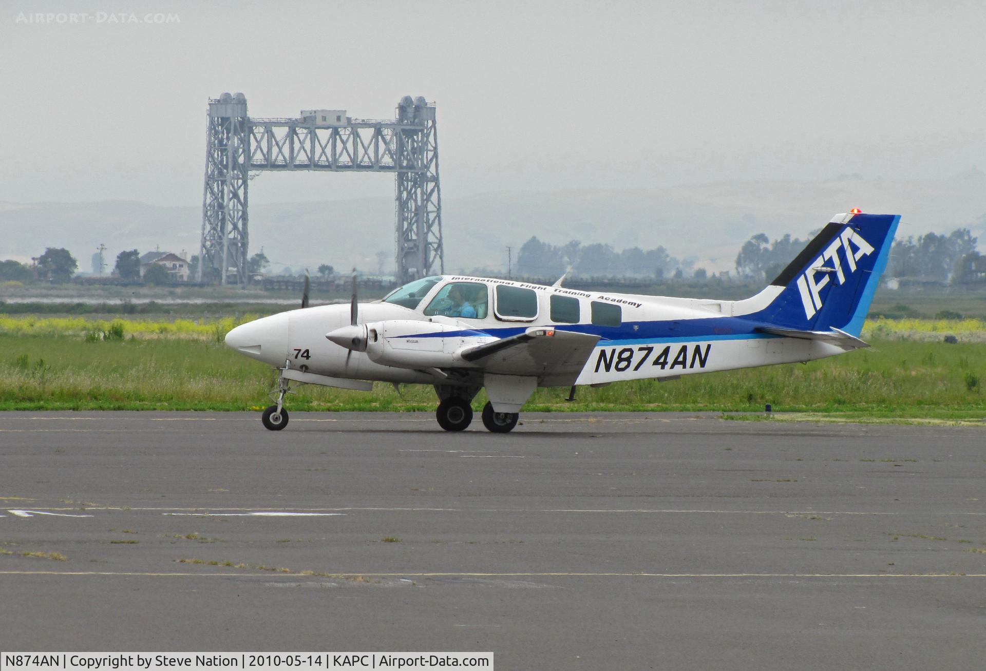 N874AN, 1993 Beech 58 Baron C/N TH-1681, IFTA/International Flight Training Academy (ANA Japan Airlines) 1993 Beech 58 in from KBFL (Meadows Field/Bakersfield, CA) with Napa River RR bridge in background