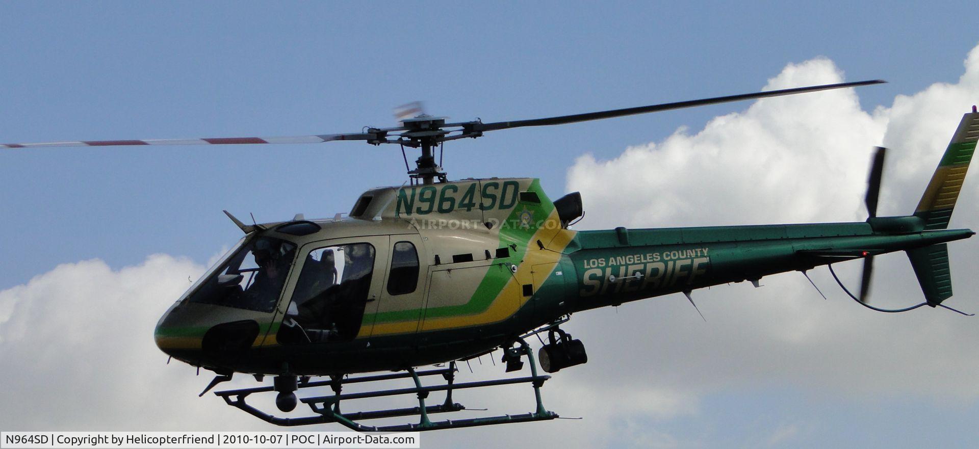 N964SD, Eurocopter AS-350B-2 Ecureuil Ecureuil C/N 3529, Lifted off and moving westerly along side runway 26L