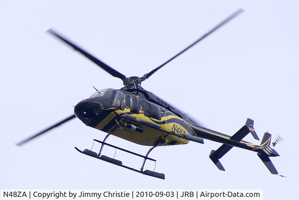 N48ZA, 2010 Bell 407 C/N 53996, Seen oveflying the East River, NY on 3 Sep 10 outbound from Downtown Manhattan/Wall St. Heliport.  Photo taken from RMS Queen Mary 2 berthed at Redhook, Brooklyn