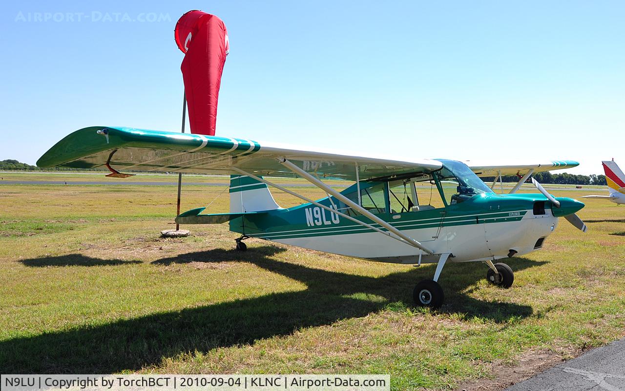 N9LU, 1997 American Champion 7GCBC C/N 1227-97, Citabria in the grass during Lancaster Open House '10.