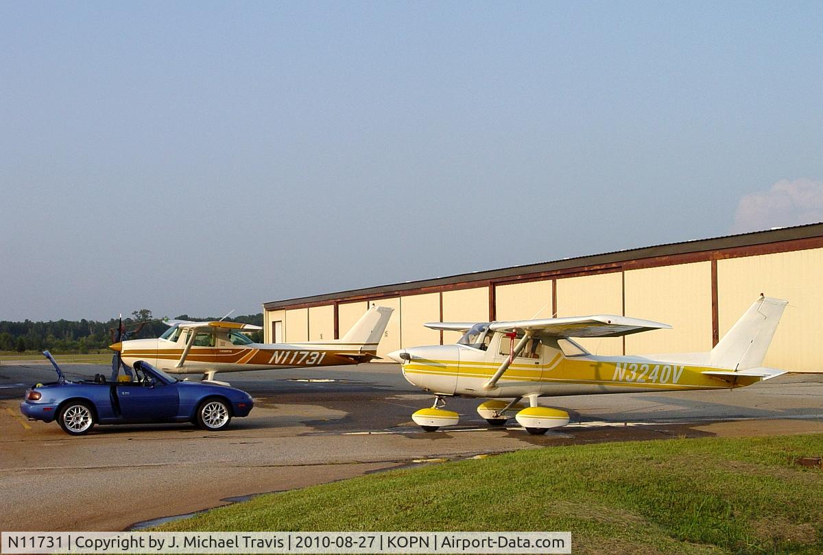 N11731, 1974 Cessna 150L C/N 15075597, 1974 Cessna 150L N11731 next to 1974 C150M N3240V.  M model has larger vertical stabilizer like a C152.  You can see the difference here.