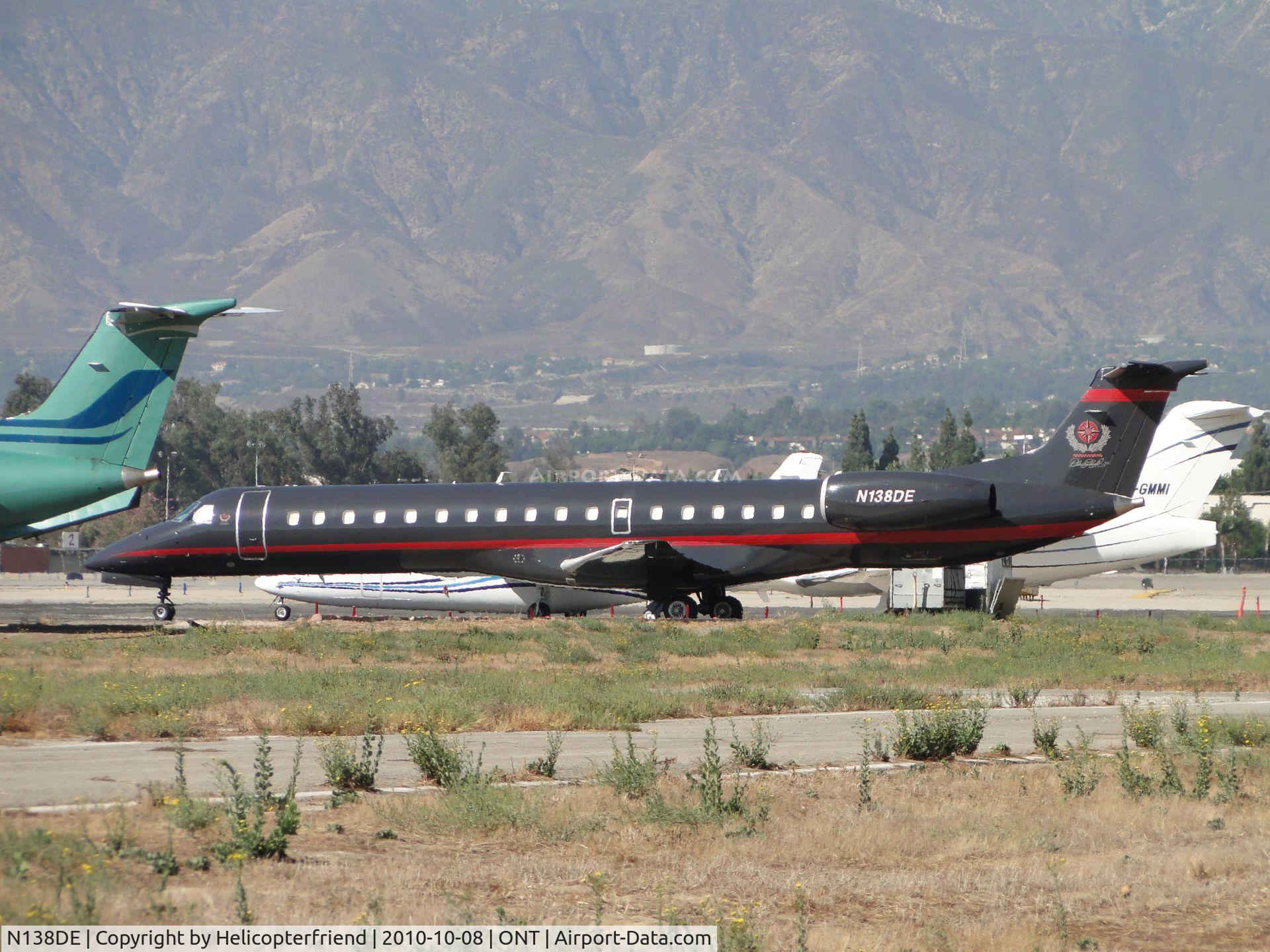 N138DE, 1999 Embraer EMB-145LU (ERJ-145LU) C/N 145129, Parked at the northside of the southern parking area