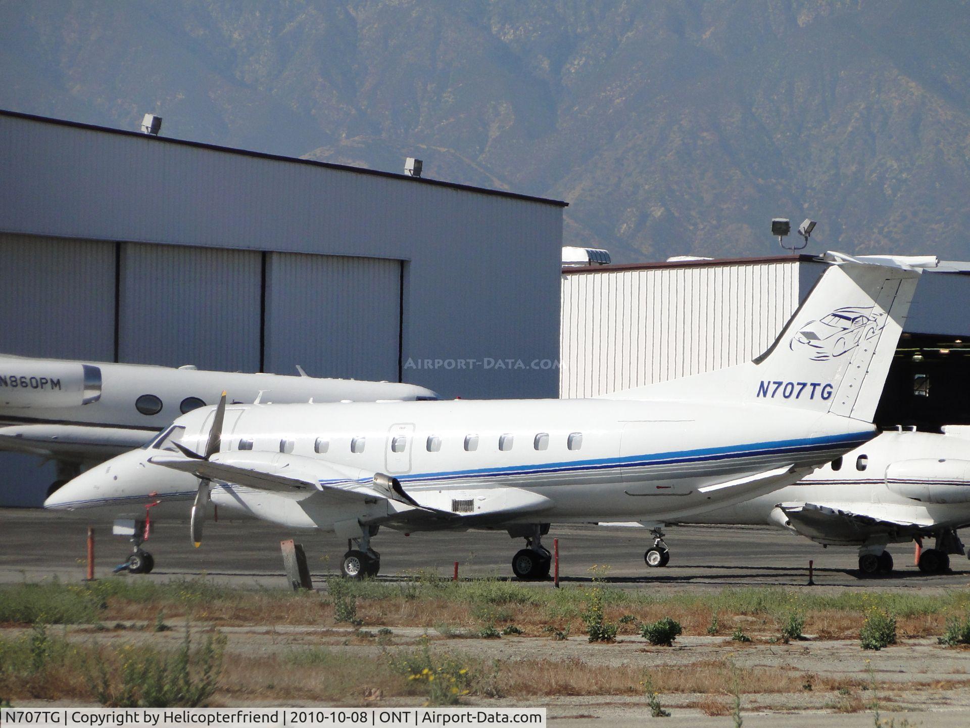 N707TG, 1990 Embraer EMB-120ER Brasilia C/N 120.182, Parked in the area with the jets on the southside