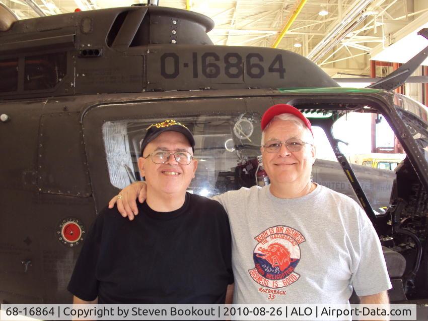 68-16864, 1968 Bell OH-58A Kiowa C/N 40178, SP/4 John Lockwood, Crewchief & CW2 Steve Bookout, Pilot, reunited with 68-16864.  They all three flew 864 together in 1970 in actual combat during the Viet Nam war.  Reunited 41 years later simply because of Airport Data.Com's photographs!
