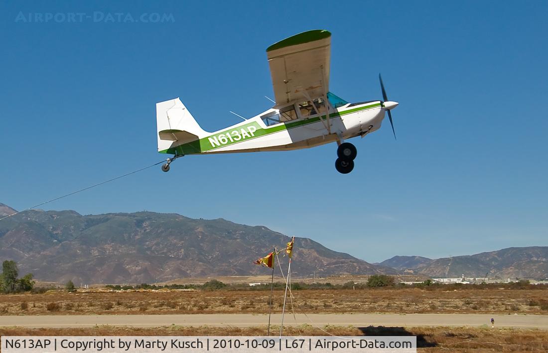 N613AP, 1976 Bellanca 8GCBC C/N 190-76, Banner pickup Runway 6.