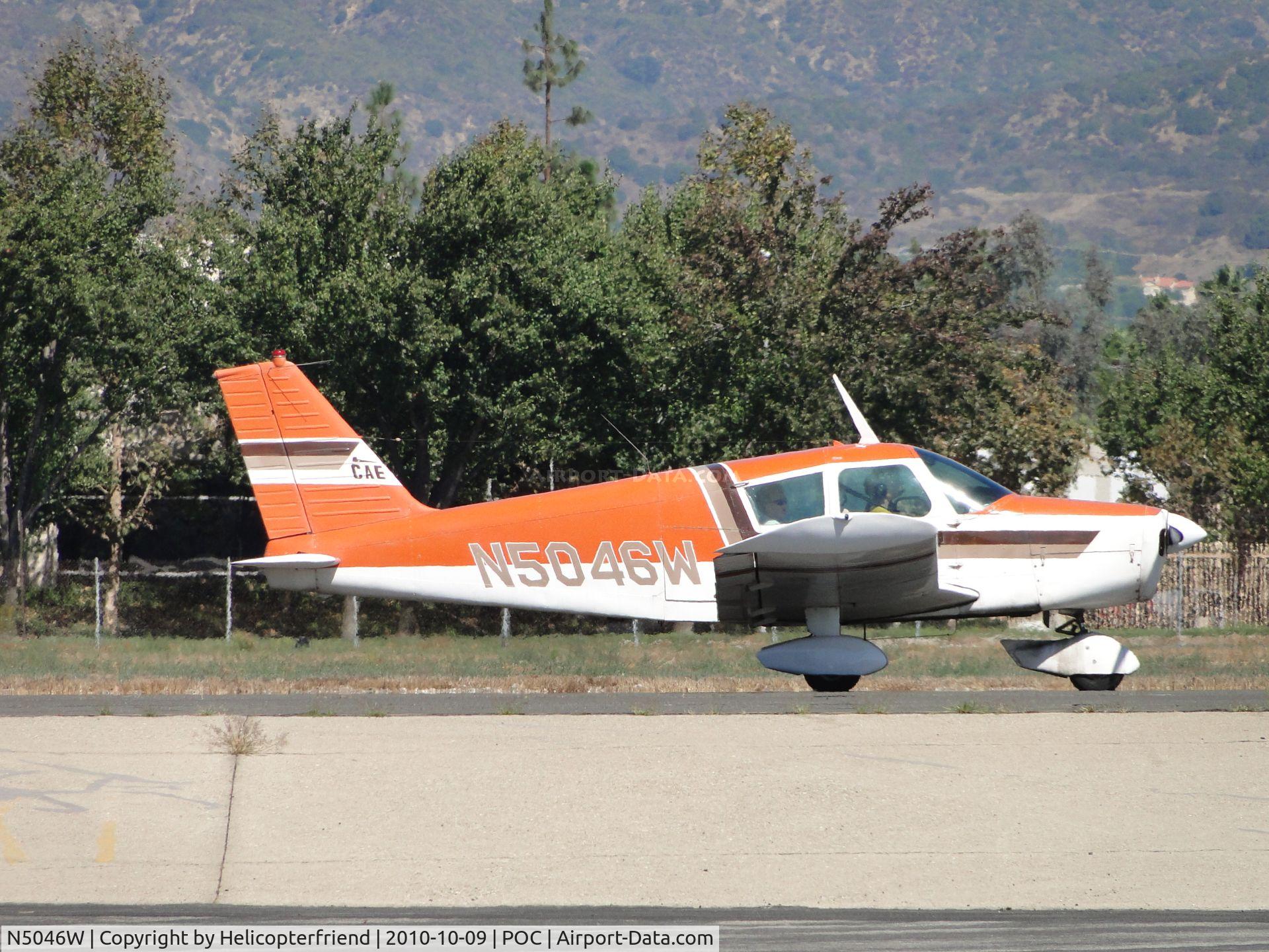 N5046W, 1961 Piper PA-28 C/N 28-48, Taxiing back to runway 26L