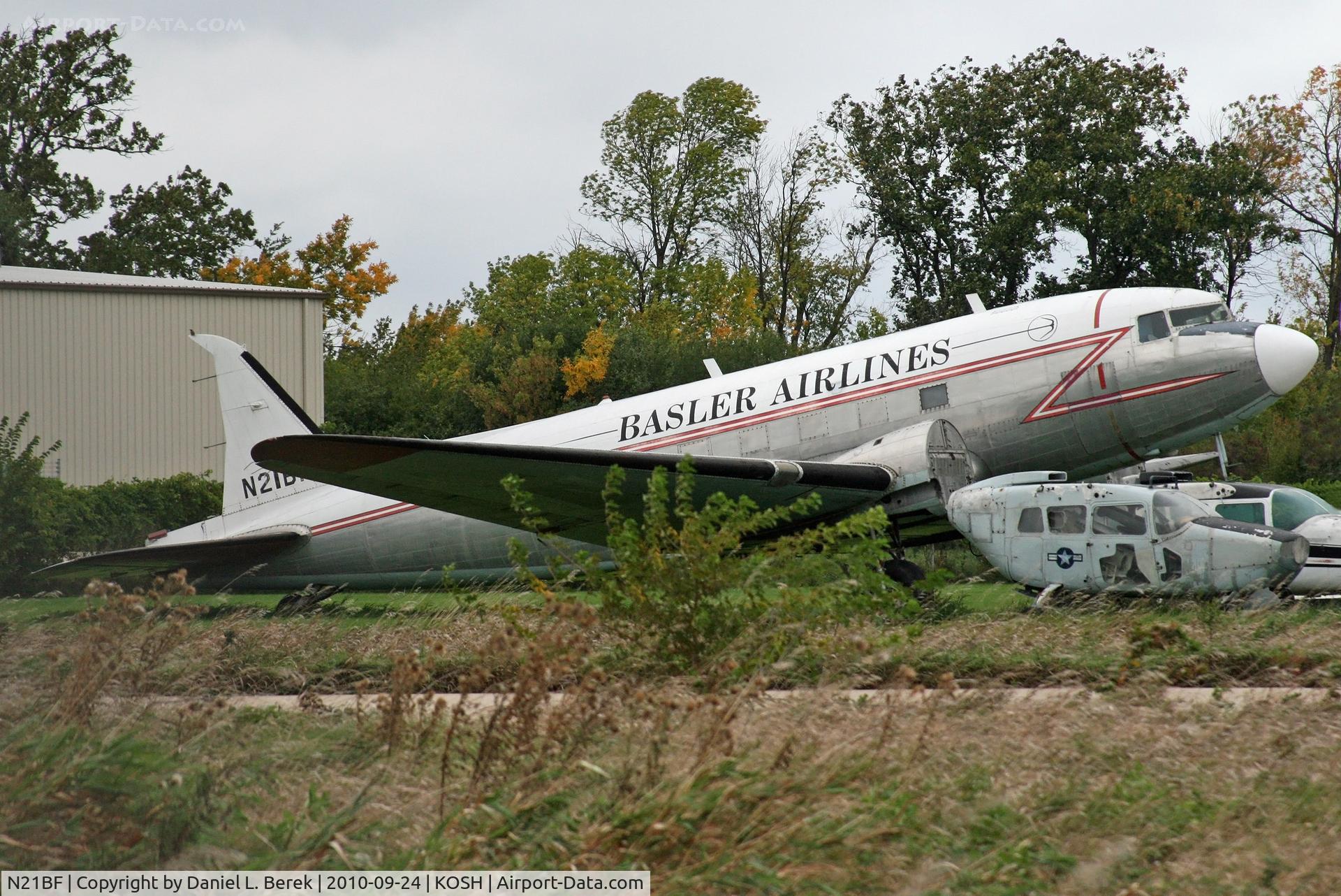 N21BF, 1943 Douglas CC-129 Dakota 3 C/N 9832, Its Canadian Air Force cheatline still visible, this C-47 airframe awaits turbo conversion at Basler.