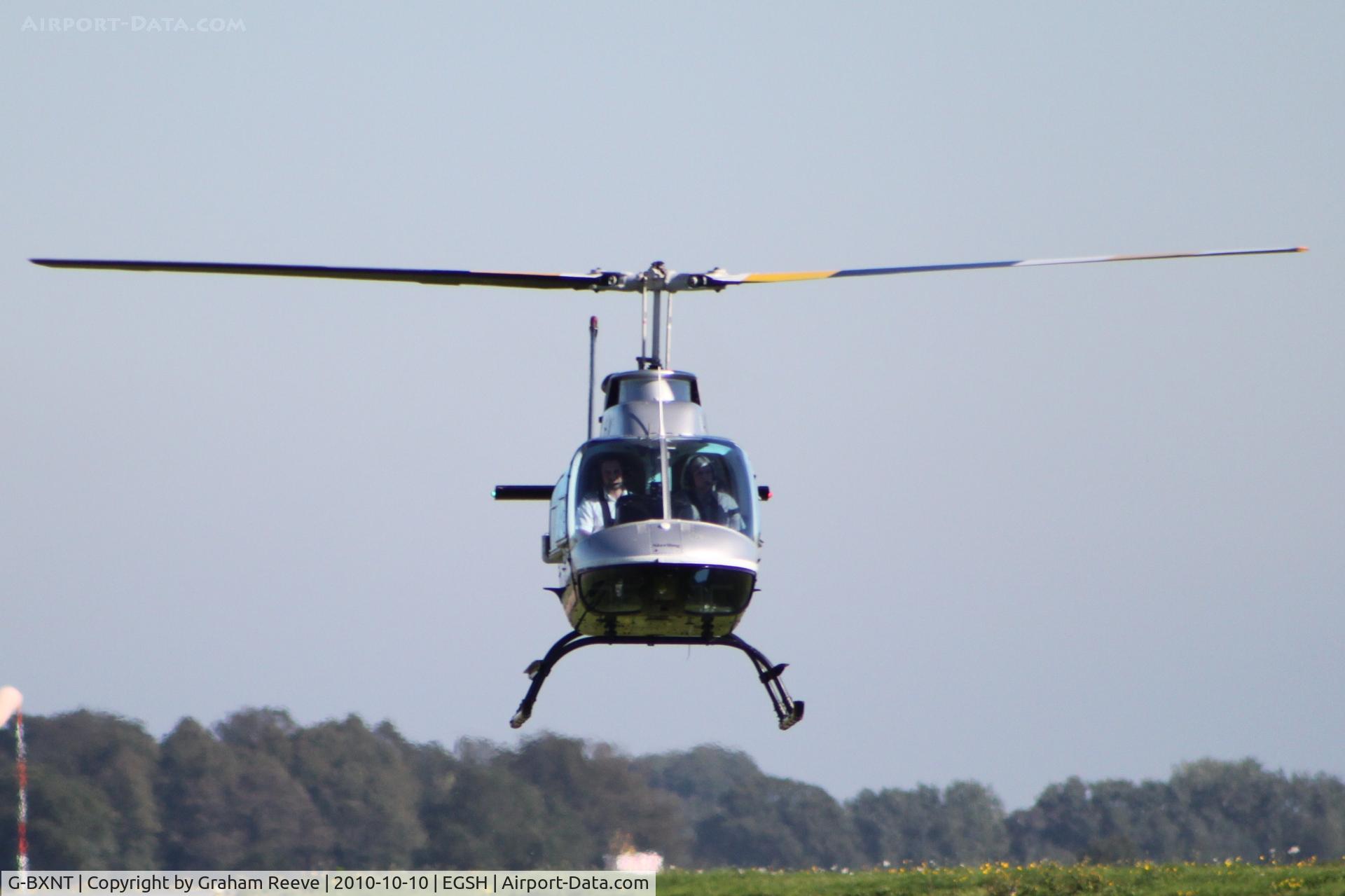 G-BXNT, 1977 Bell 206B JetRanger III C/N 2398, Landing at Norwich.