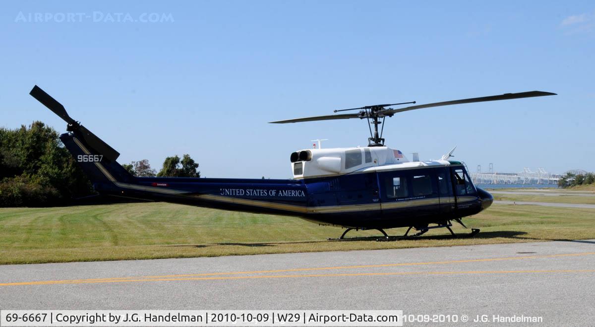 69-6667, 1969 Bell UH-1N Iroquois C/N 31073, At Bay Bridge Airport MD with By Bridge in sight