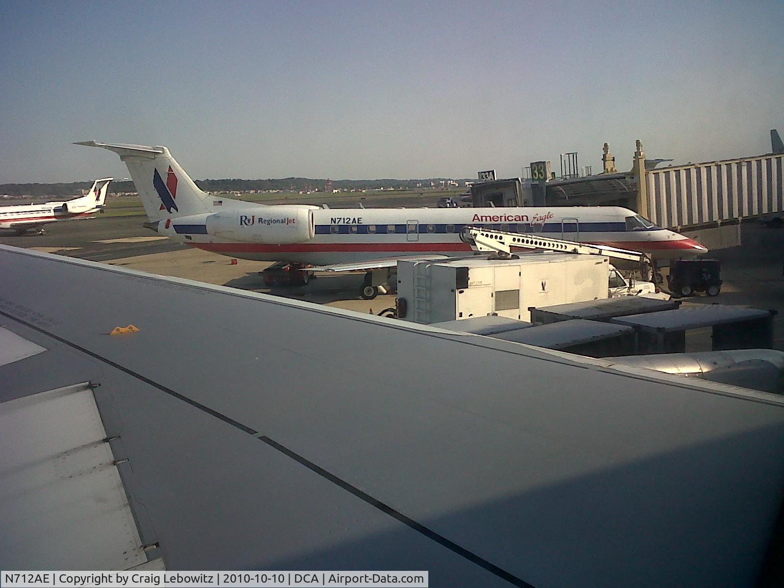 N712AE, 2000 Embraer ERJ-135LR (EMB-135LR) C/N 145247, At gate 33