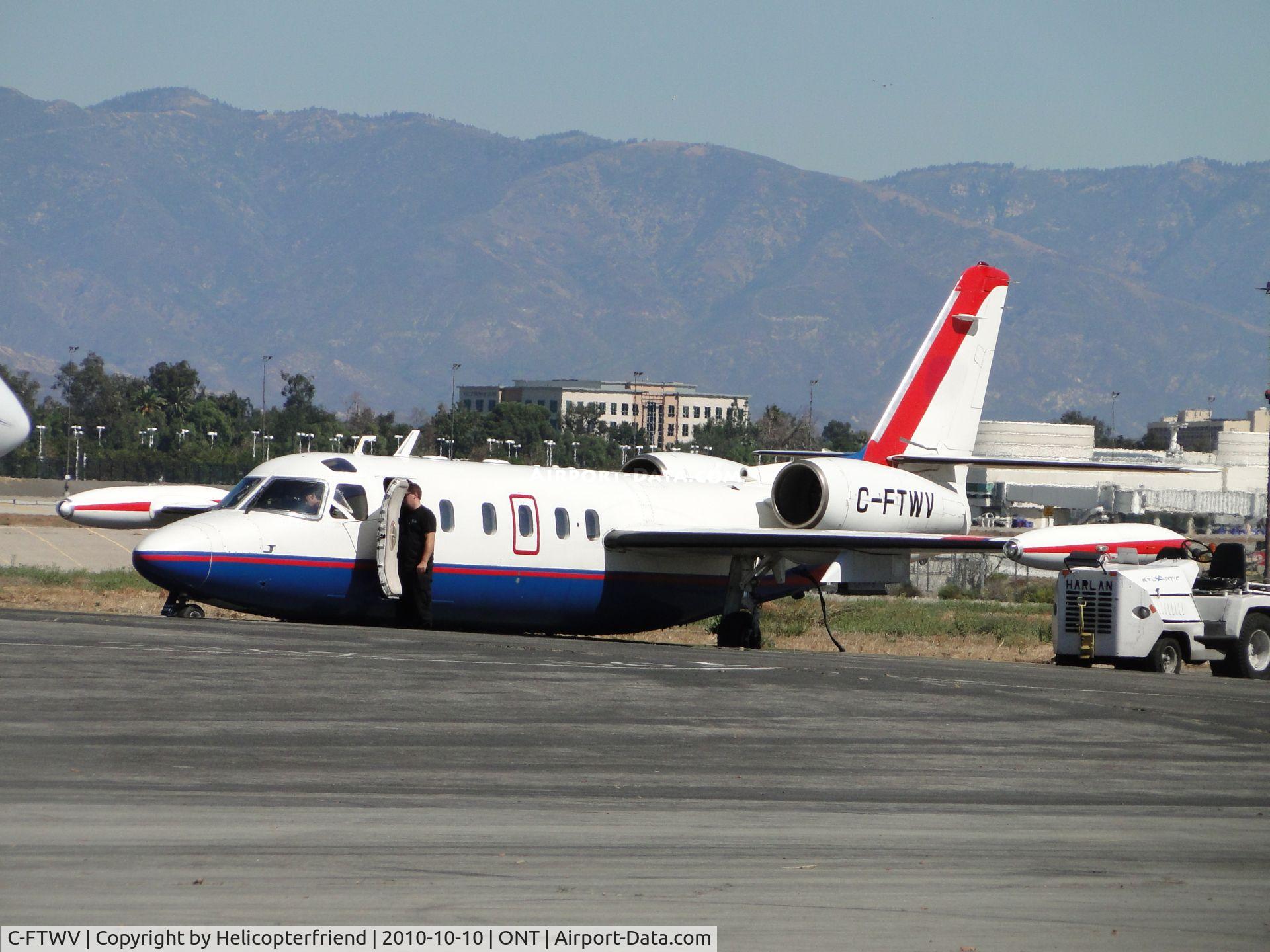 C-FTWV, 1997 Israel Aircraft Industries IAI-1124 Westwind C/N 226, Parked on the edge of the parking apron on the southeast side being readied for flight