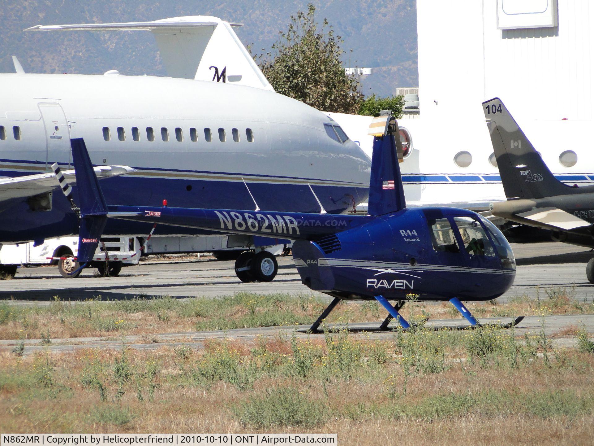 N862MR, 2004 Robinson R44 II C/N 10420, Parked amonst a group of jets including Canadian Fighter planes