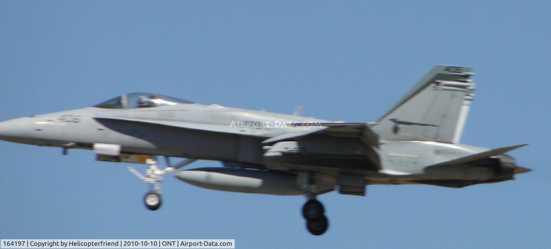 164197, 1990 McDonnell Douglas F/A-18C Hornet C/N 0960/C192, Coming in hot on final to runway 26R from a flight of four that flew formation for races in Fontana and from Squadron VFA-94