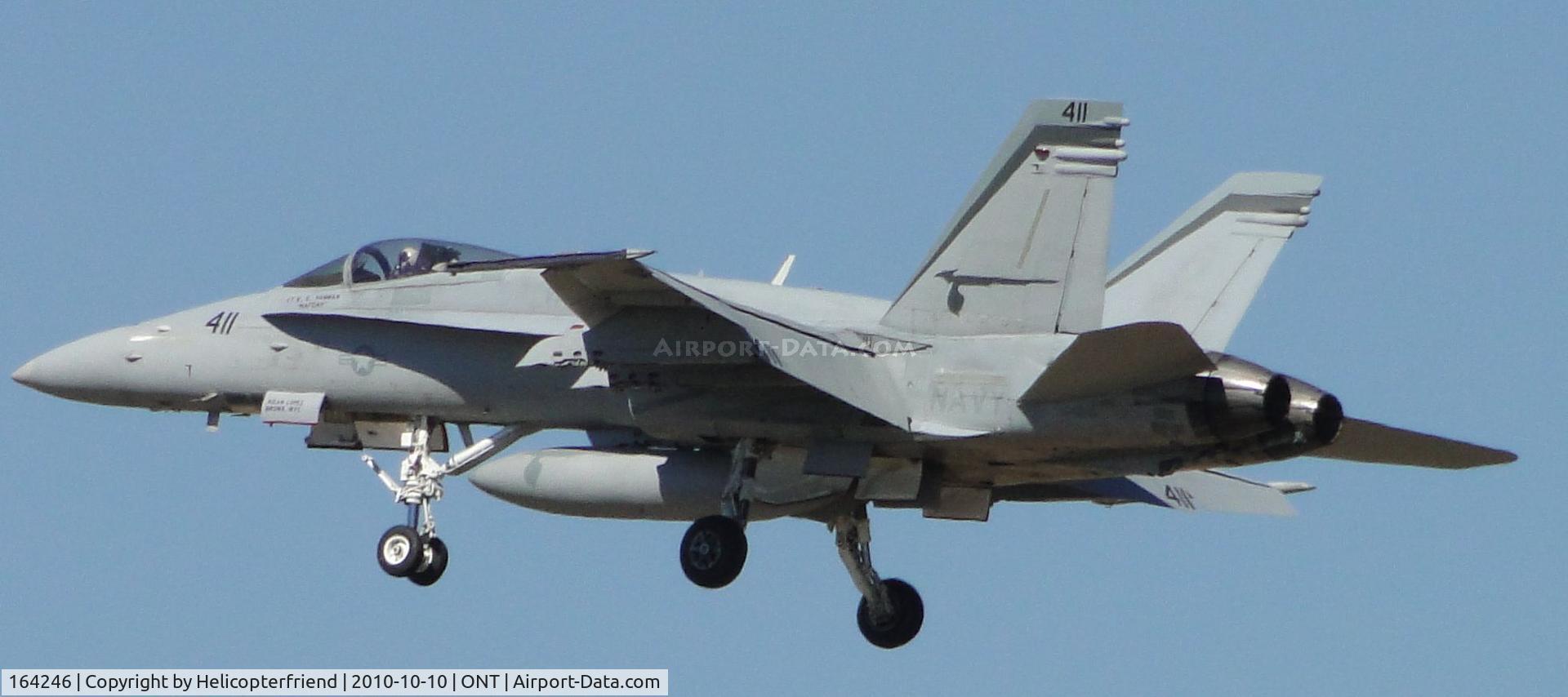 164246, 1991 McDonnell Douglas F/A-18C Hornet C/N 1009, Part of a four ship formation flight on final to runway 26R after a formation flyover for Fontana races, from Squadron VFA-94