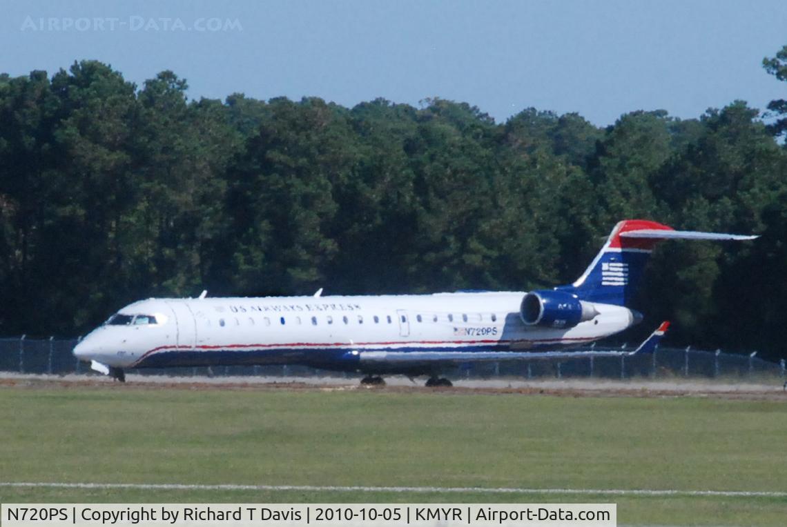 N720PS, 2004 Bombardier CRJ-700 (CL-600-2C10) Regional Jet C/N 10178, 2004 Bombardier CL-600-2C10 waiting to take off in Myrtle Beach as the heat rises..