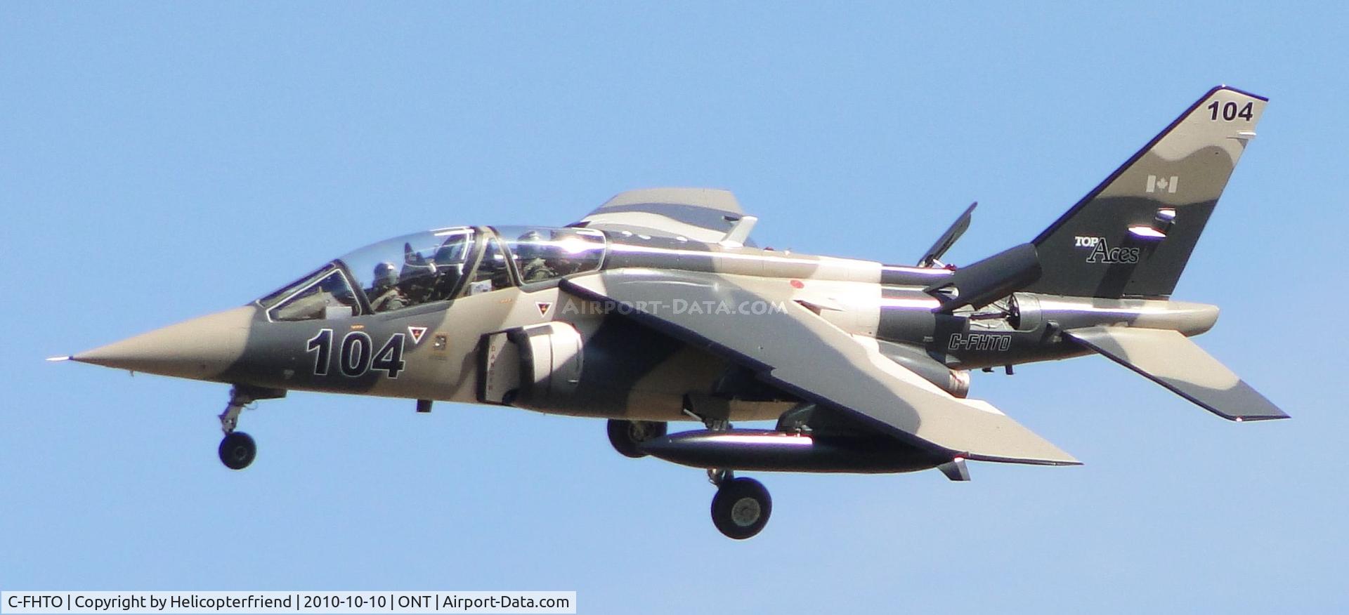 C-FHTO, 1981 Dassault-Dornier Alpha Jet A C/N 104, On final after a four plane flight by Top Ace's Inc, who are contracted for CATS (Contracted Airborne Training Services) out of Quebec, Canada