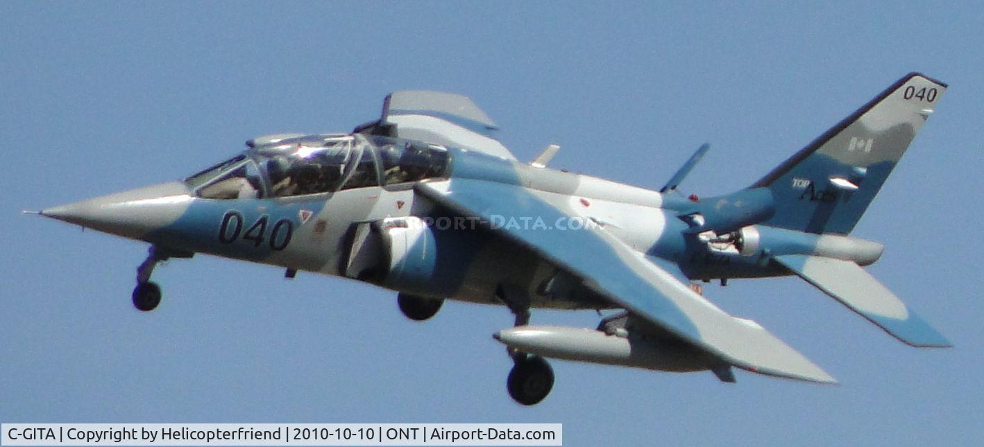 C-GITA, 1980 Dassault-Dornier Alpha Jet A C/N 040, Turning final to runway 26R after a formation flight with three other aircraft, from Top Ace's Inc, Quebec, Canada