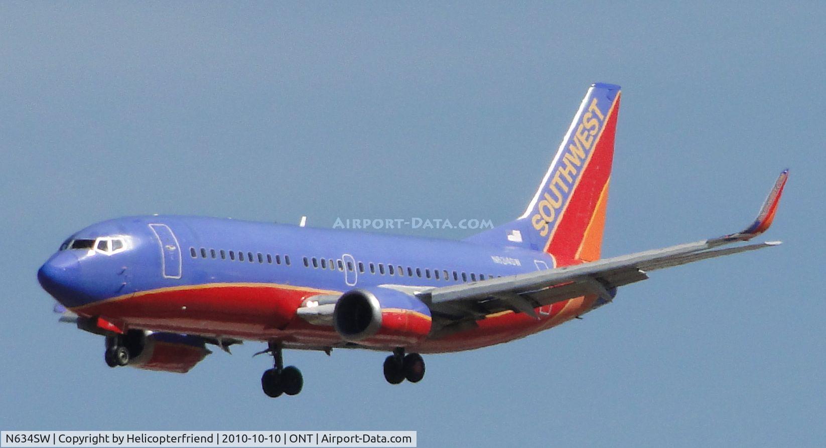 N634SW, 1996 Boeing 737-3H4 C/N 27937, On final to runway 26R before Military aircraft arrived