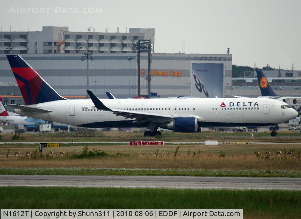 N1612T, 2001 Boeing 767-332 C/N 30575, Lining up rwy 07L for departure...