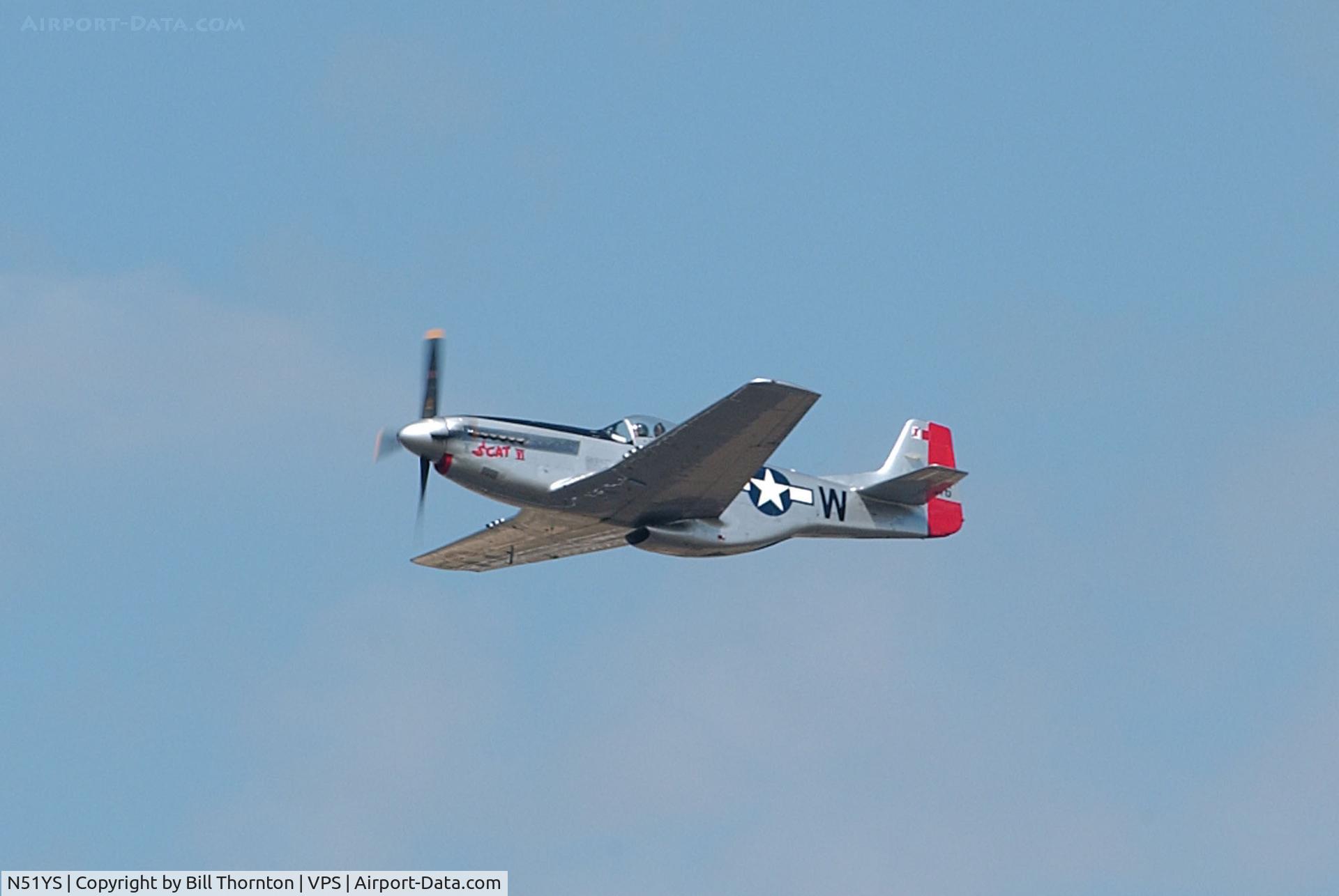 N51YS, 1945 North American P-51D Mustang C/N 122-39285, N51YS, Tail No. 411746, a P-51D (25NA), owned by Denny Hickman of Alabama, makes a fast low approach to Rwy 19 at Eglin AFB, Fla. during a vintage aircraft demo during the 2010 Eglin Air Show. (an f-stop 5.6 photograph)