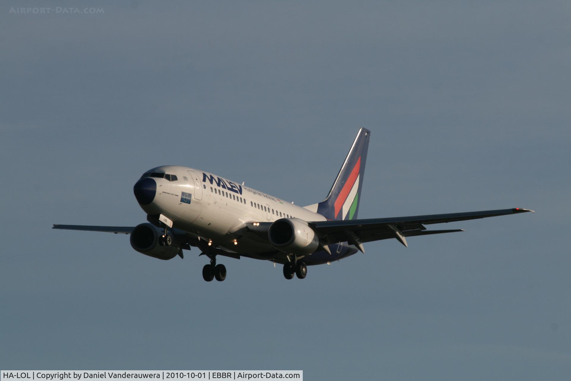 HA-LOL, 2004 Boeing 737-7Q8 C/N 29352, Flight MA600 on approach to RWY 25L
