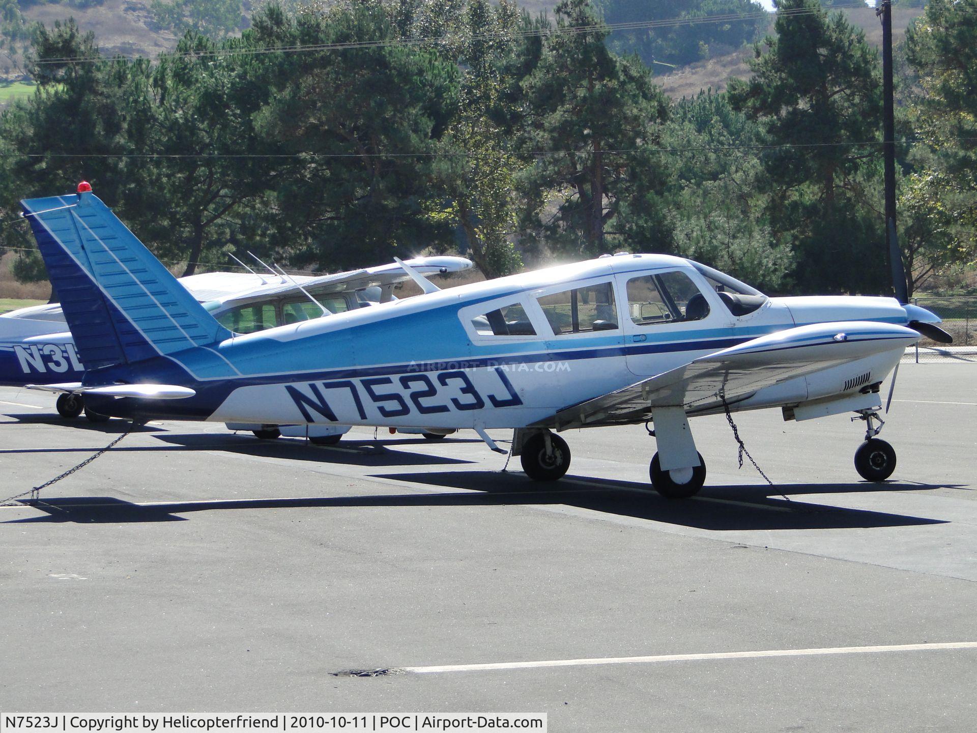 N7523J, 1969 Piper PA-28R-180 Cherokee Arrow C/N 28R-31100, Tied down and parked in transient parking