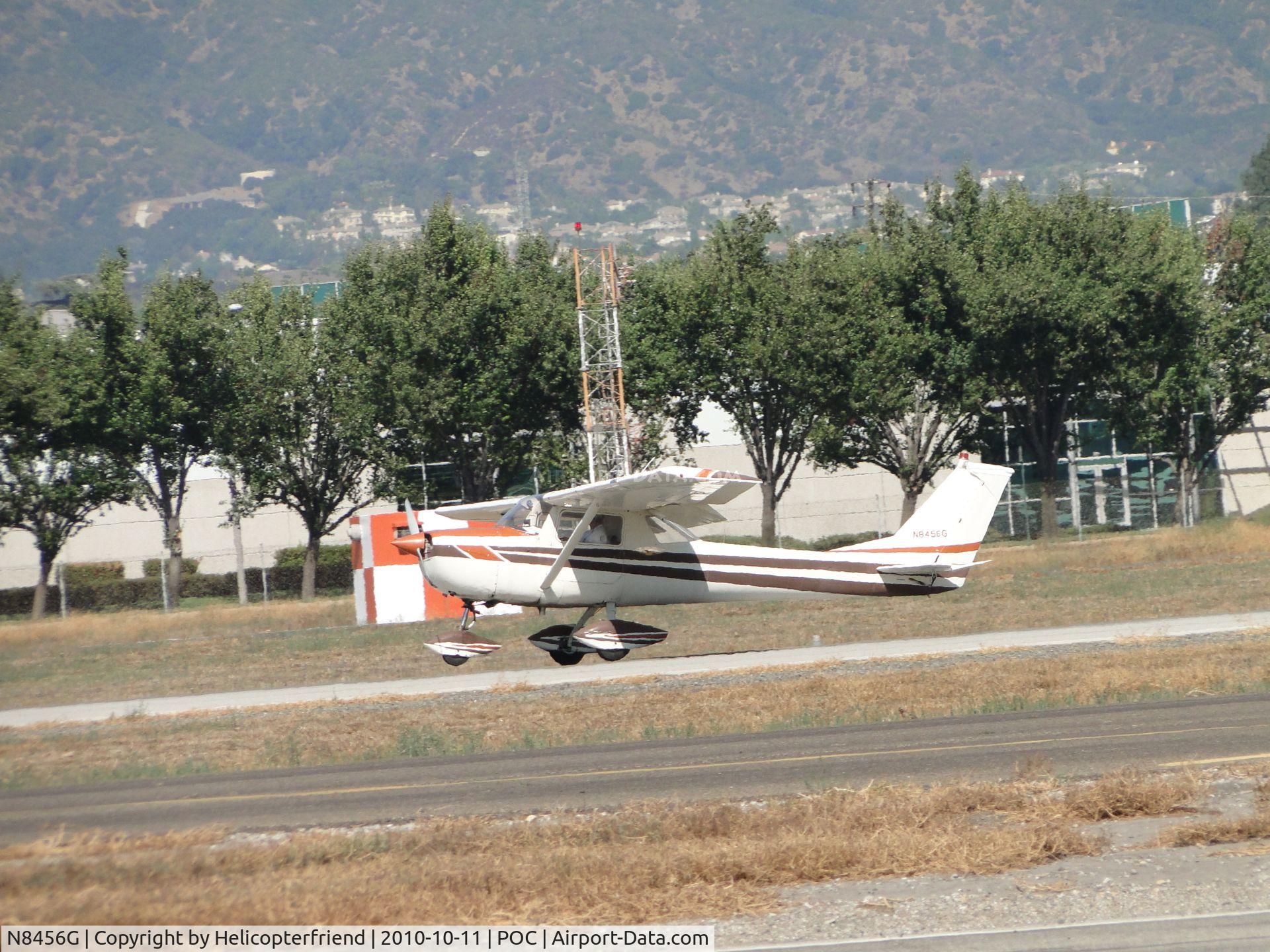 N8456G, 1965 Cessna 150F C/N 15062556, Landing on 26R, nose still in the air