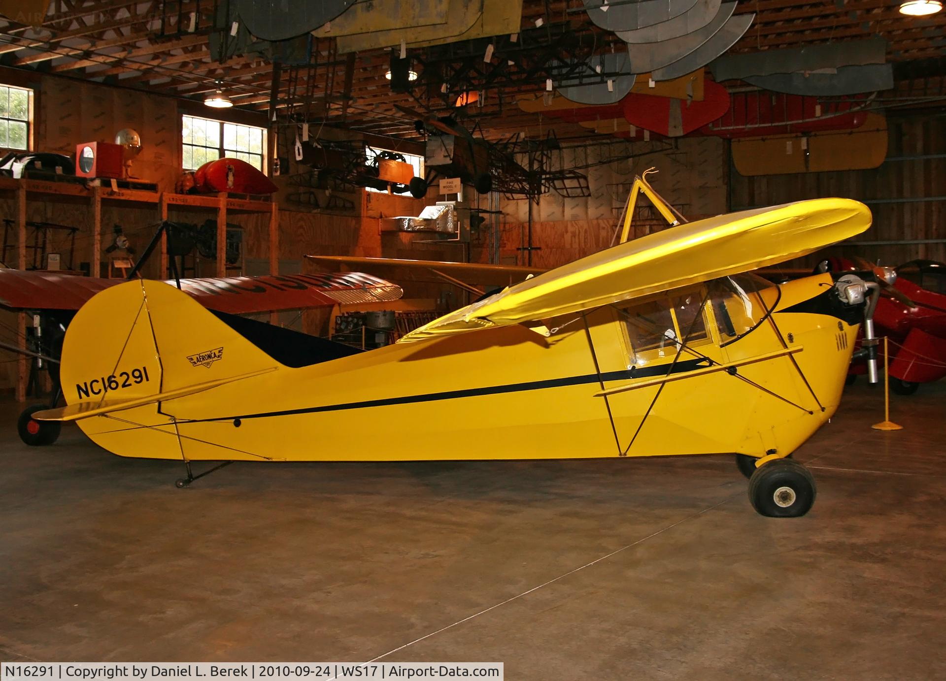N16291, 1936 Aeronca C-3 C/N A-668, On display among other Golden Age aircraft in one of the several hangars bordering Pioneer Field.