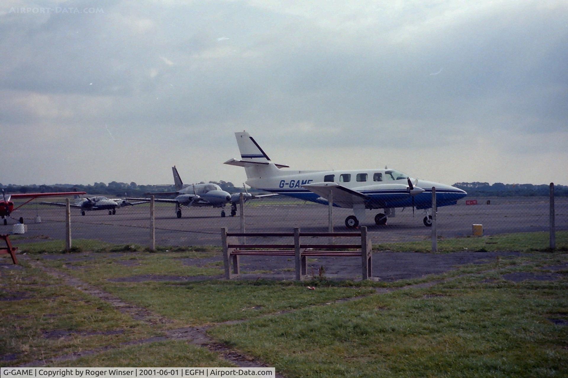 G-GAME, 1982 Cessna T303 Crusader C/N T303-00098, Based at Swansea Airport in the early 2000's. The date is estimated.