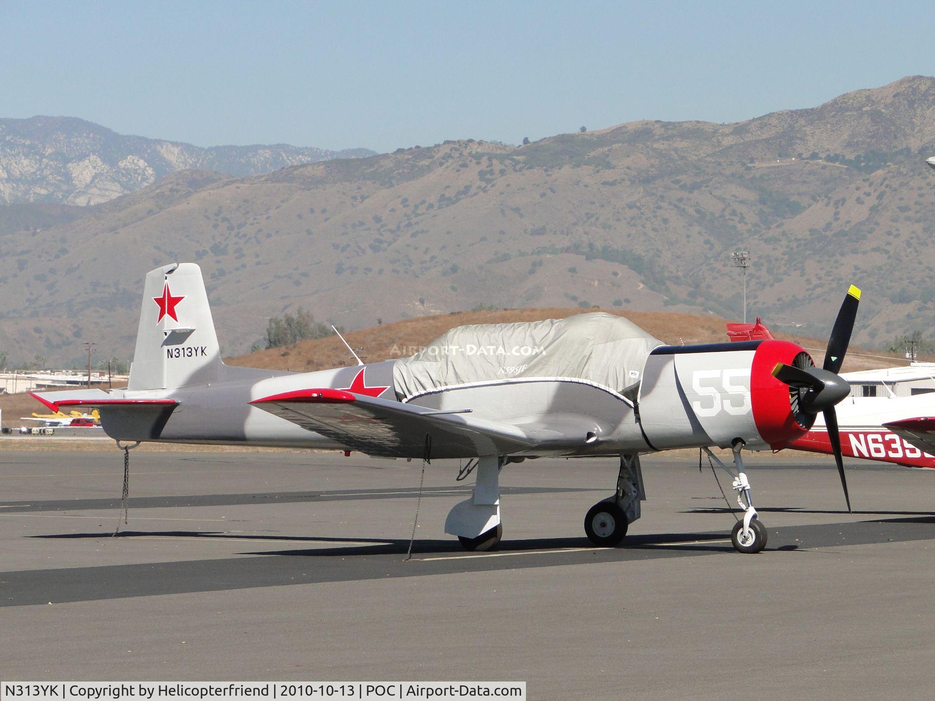 N313YK, 1964 Nanchang CJ-6A C/N 1032013, Parked and covered up in transient parking.