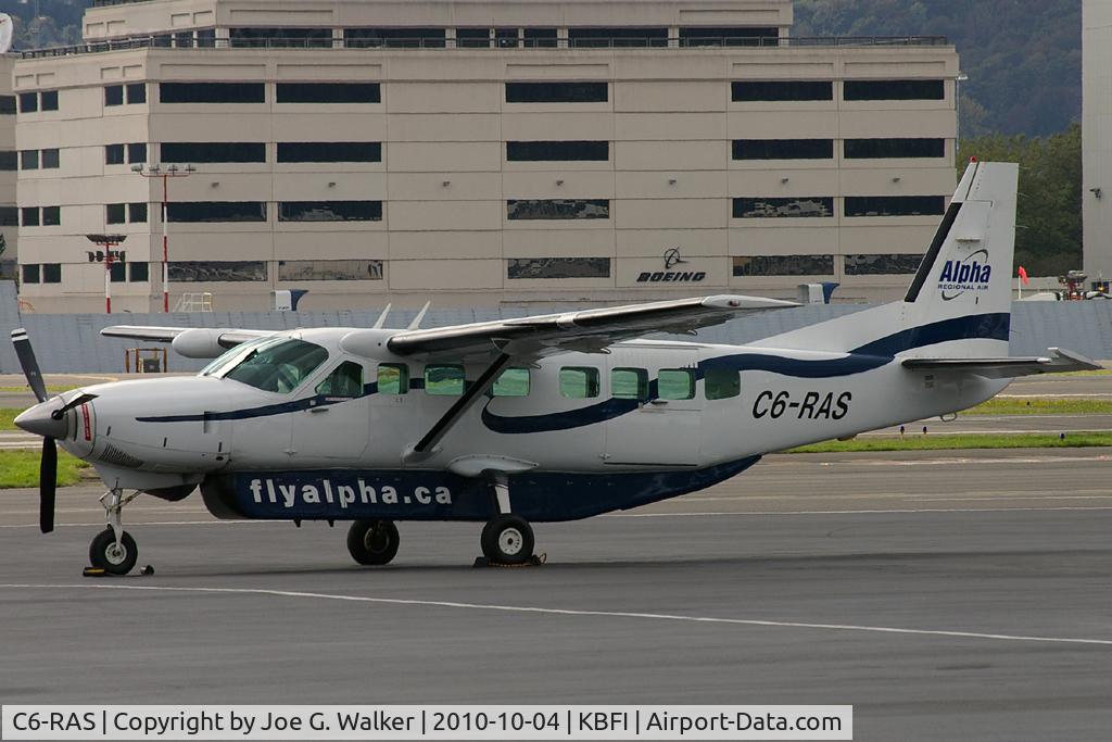 C6-RAS, 1998 Cessna 208B Grand Caravan C/N 208B0693, Seen during a brief refueling stop at BFI, was this Cessna 208B of Alpha Regional Air.
