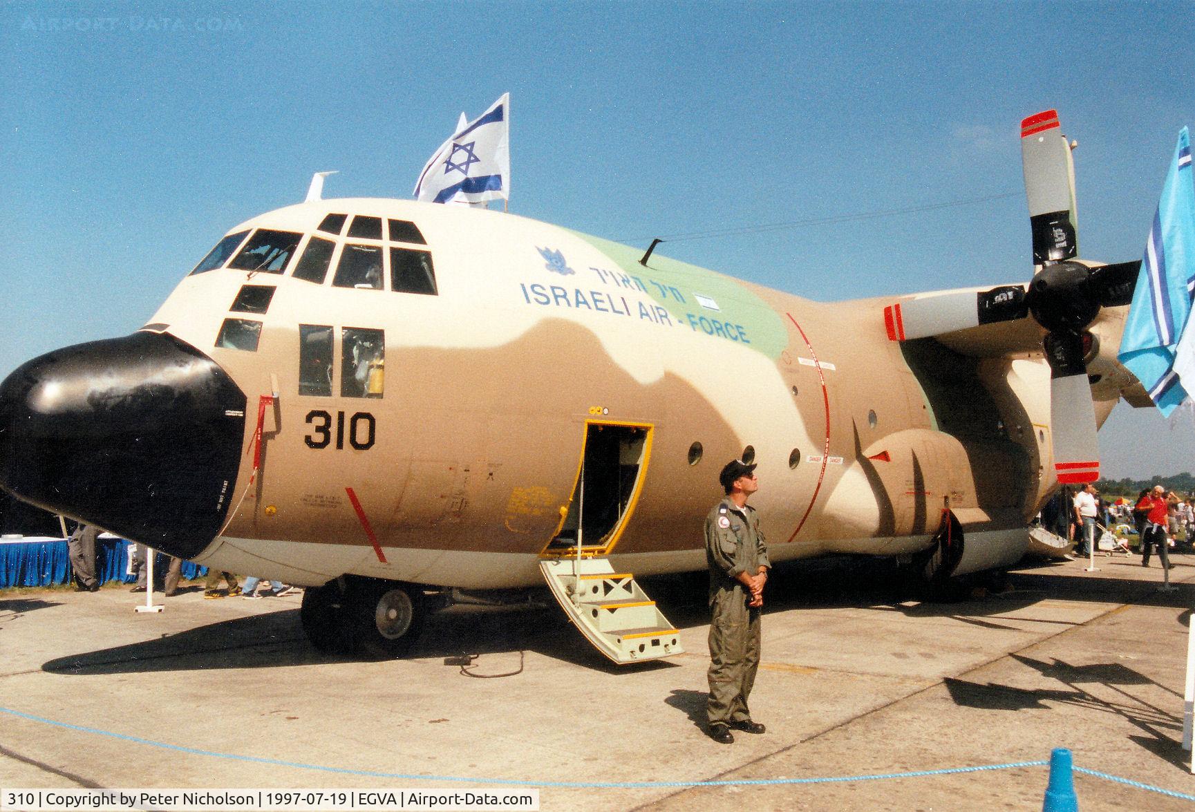 310, Lockheed C-130E Karnaf Hercules C/N 382-3880, C-130E Hercules, callsign Israeli 009, of 103 Squadron Israeli Air Force on display at the 1997 Intnl Air Tattoo at RAF Fairford. The aircraft also carried civil registration 4X-FBG.