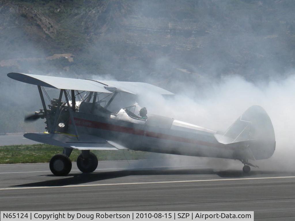 N65124, 1943 Boeing A75N1(PT17) C/N 75-1260, 1943 Boeing Stearman A75N1 'Spirit of OPEC', P&W R-985 Wasp Jr. (by Jacobs) 450 Hp upgrade, square wingtips, runway smoke act