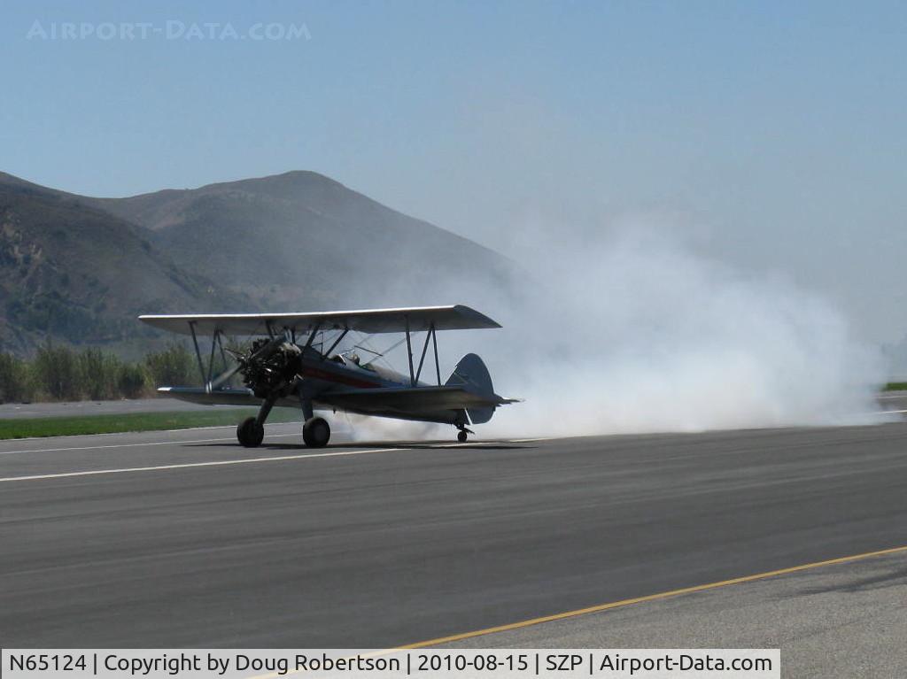 N65124, 1943 Boeing A75N1(PT17) C/N 75-1260, 1943 Boeing Stearman A75N1 'Spirit of OPEC', P&W R-985 Wasp Jr. (by Jacobs) 450 Hp upgrade, square wingtips, runway smoke act