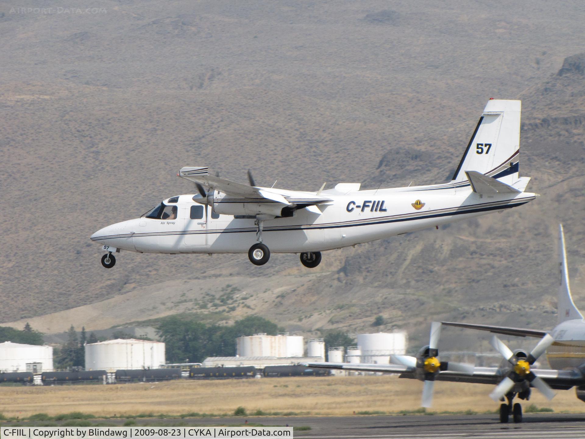 C-FIIL, 1974 Rockwell 690A Turbo Commander Turbo Commander C/N 11167, ...Air Spray Commander over the threshold.