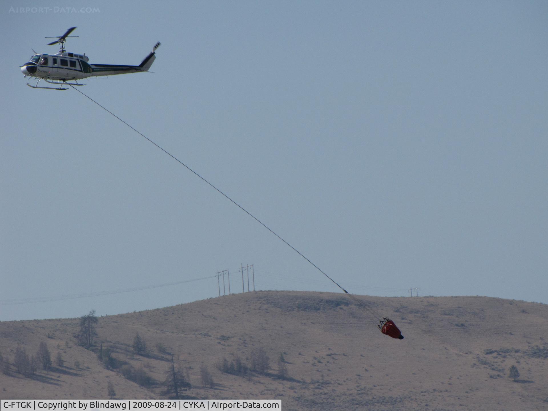 C-FTGK, 1968 Bell 205A-1 C/N 30009, ..Bell 205A heading for a fire.