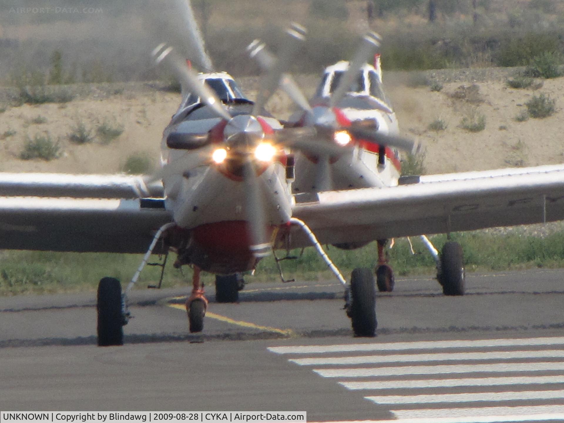 UNKNOWN, Miscellaneous Various C/N unknown, ...a pair of Air Tractors ready to go.