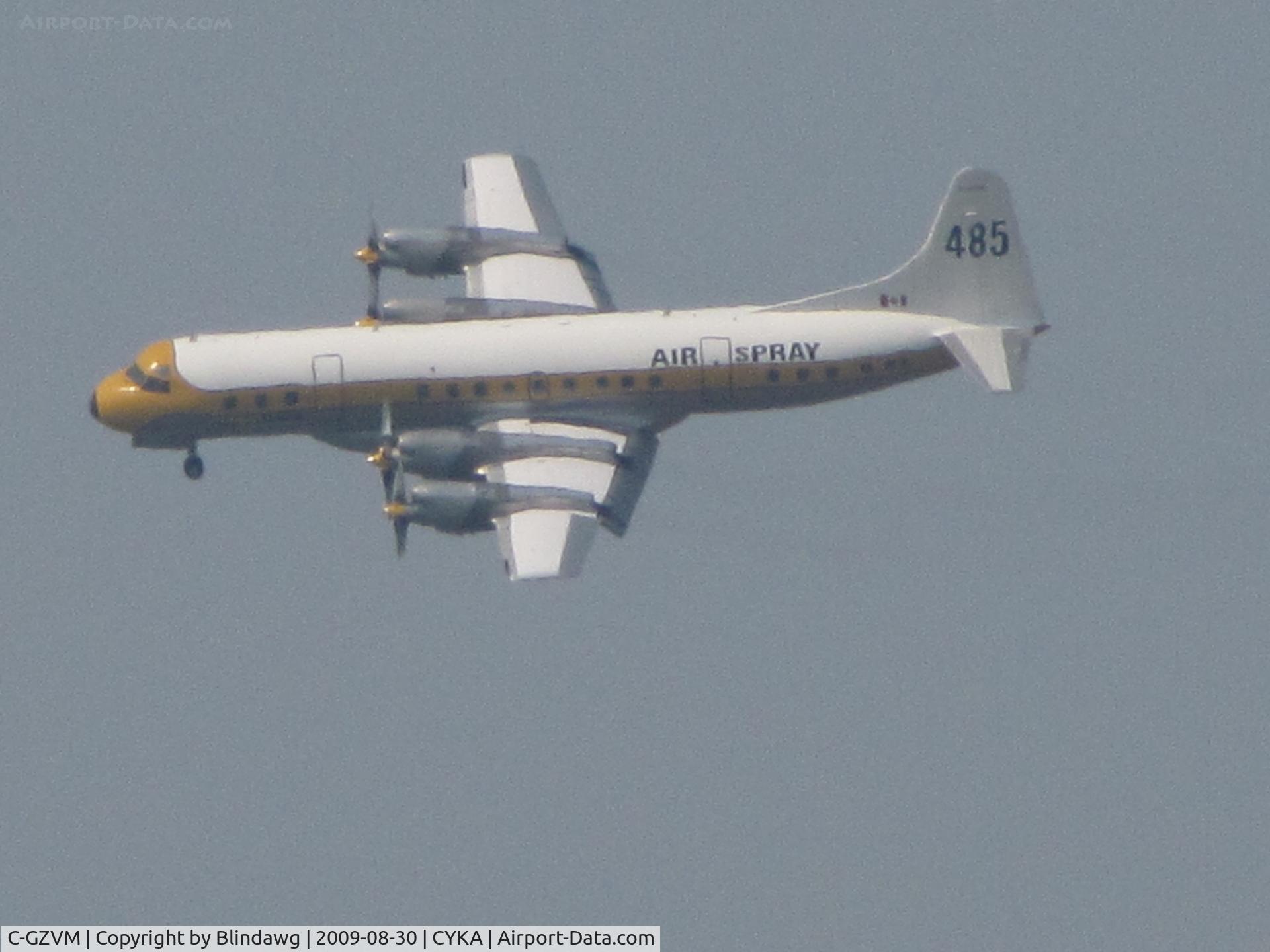 C-GZVM, 1959 Lockheed L-188A Electra C/N 1036, ...turning final....LOTS of smoke in the area