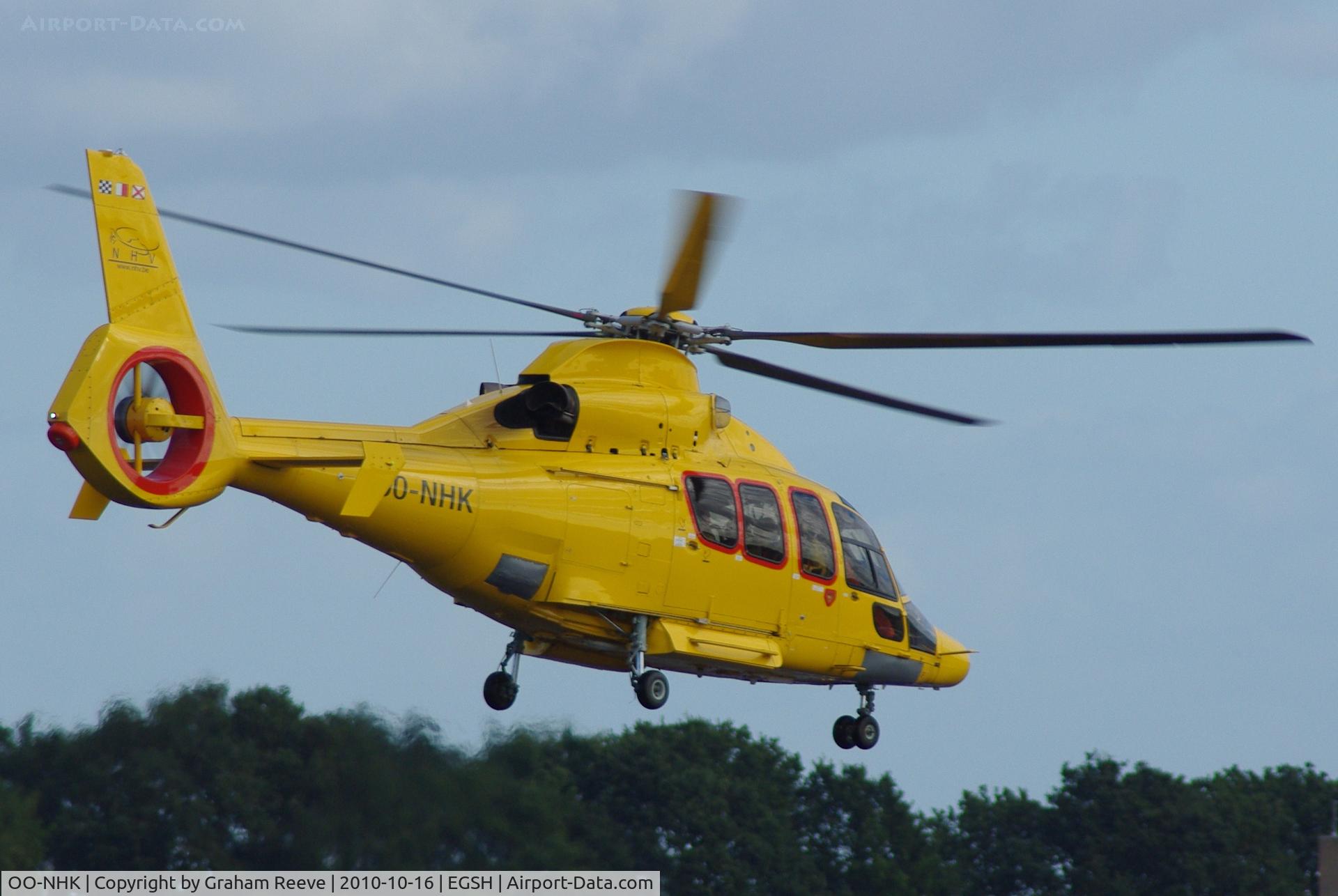 OO-NHK, 2009 Eurocopter EC-155B-1 C/N 6876, Departing from Norwich.