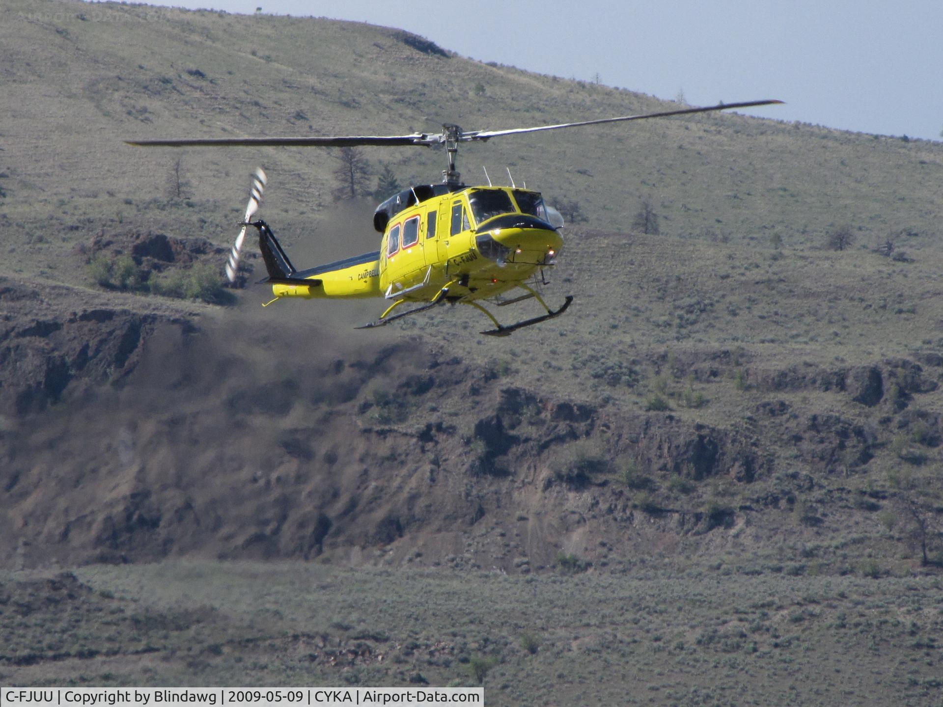 C-FJUU, 1976 Bell 212 C/N 30795, ...212 coming in for fuel