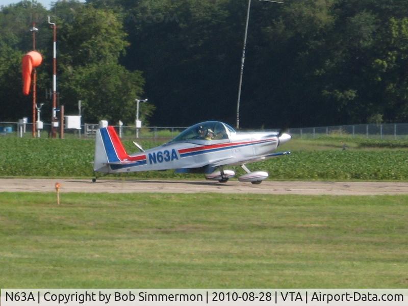 N63A, 1990 Bushby Mustang II C/N M-II-784, Arriving at the Newark, Ohio breakfast fly-in.